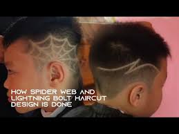 It is important that the bangs appear to be covering a lobotomy scar and that the buzzed pattern resembles a lightning bolt. How To Have A Spider Web And Lightning Bolt Haircut Design Youtube