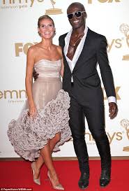 Check spelling or type a new query. Heidi Klum Is Removing Her Seal Tattoo As She Moves On With Martin Kristen Daily Mail Online