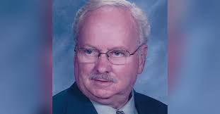 James Edward Warburton Obituary