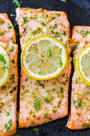 Place the fillets skin side down onto a baking tray lined with baking paper. Baked Salmon With Garlic And Dijon Video Natashaskitchen Com
