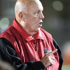 College football coach calls a timeout to announce his retirement, then  walks off the field