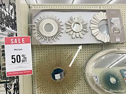 When replacing an old light fixture, i noticed that the new fixture had a smaller base which didn't fully cover the drywall gaps around electric box. Turn A Wall Mirror Into A Gorgeous Ceiling Medallion Diy The Aspiring Home