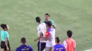 Referee confronted by Player