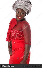 Beautiful African lady in traditional red dress.Isolated Stock Photo by  ©len4ik40 155879970
