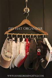 20 Creative Ways To Organize And Decorate With Hangers Diy Hat Organizer Hat Organization Diy Hat