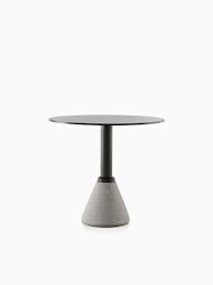 A Black Magis Table One Bistro Outdoor Table With A Round Top And Concrete Base Table Outdoor Tables Bistro