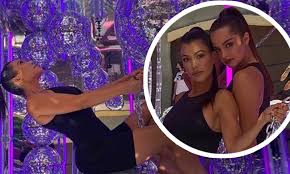 The singer herself posed atop the nissan in a cutoff pink. Kourtney Kardashian Twins With Addison Rae In Miley Cyrus Midnight Sky Truck Daily Mail Online