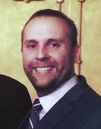 Axelrod to students: “Steer us to a better place.”