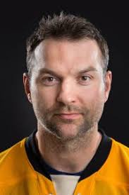 Enter to Win a Jersey signed by John Scott (NHL) or Joe Berger (NFL)