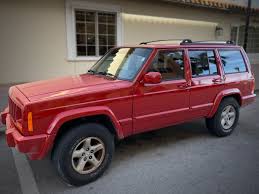 Image result for Flame Red 1997 Jeep