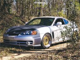 Image result for Sunny Yellow 2004 Tiburon