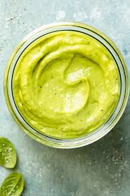 Blend mayonnaise, sour cream, parsley, tarragon, chives, lemon juice, rice vinegar, anchovy fillet, garlic, cayenne pepper, salt, and black pepper in a blender until smooth. Avocado Green Goddess Dressing No Spoon Necessary