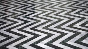 Dark wood floors and a white kitchen island with marble countertops create a rich and relaxing experience. Zigzag Black And White Marble Stock Footage Video 100 Royalty Free 15397504 Shutterstock