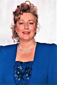 squeaky quavering voice) "Allo? My name's Marjorie Rowan..." And Roy once  again sees our Evil-lyn in action!