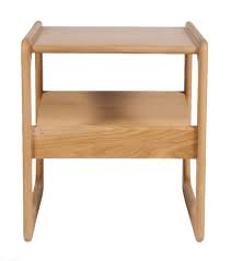 For deeper storage, look for a coffee table with storage baskets. Side Table With Magazine Holder Oak The Modern Furniture Store