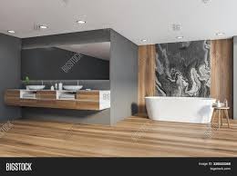 Freestanding carrara marble bathtub carved from a solid natural block of marble. Black Marble Wooden Image Photo Free Trial Bigstock