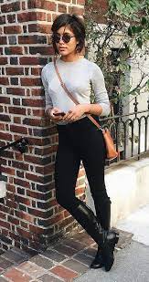 A Sweater Leggings And Riding Boots Ridingboots Black Boots Outfit Riding Boot Outfits Tall Black Boots Outfit