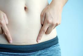 The surgeon sews up the incision in the mother's abdomen. What Is More Painful C Section Or Natural Birth