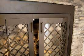 Custom piece, tree branch fireplace screen. Fireplace Doors Fireplace Door Custom Fireplace Doors
