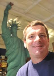 Banner shop adds jobs, expands despite economy