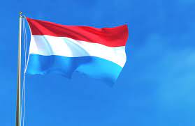 Watercolor background with paint splashes in luxembourg flag colors. National Day In Luxembourg Themayor Eu