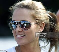 Morgan Norman, Greg Norman's Daughter watches her father play during...  News Photo