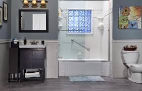 This contemporary master bath is elegant and inviting with an airy, sandy tile backsplash, blonde double vanity and natural stone floors. Small Bath Remodel One Day Guest Bathroom Remodeling Bath Planet