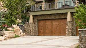 How much does it cost to build a garage? 2021 Wood Garage Doors Prices Wood Garage Door Cost