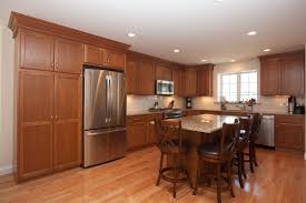 Kitchen cabinets are the elephants in the kitchen; L Shaped Kitchen Design Medium Color Maple Kitchen Cabinets With Island Maple Kitchen Cabinets Kitchen Layout Kitchen Island Cabinets