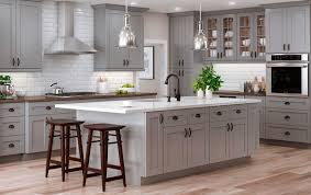 For this reason, we love the beautiful variations and color veins in stone. Warm Grey Cabinets In Classic Shaker Cabinets Transitional Kitchen Houston By Lindberg Flooring Remodeling Houzz
