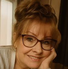 I'm not so sure hand feeding the hummingbirds is a good idea...thoughts ?