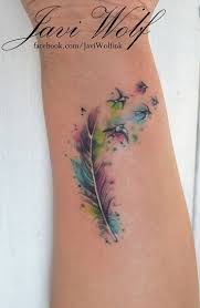 When mixed, we get the meaning of the black bird tattoo. Watercolor Feather With Flying Birds Tattoo Design For Wrist