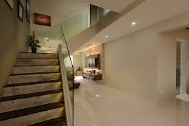 (interior design by free space intent) (interior design by free space intent) working to achieve a streamlined look, in this maisonette, the staircase is hidden this side of the room by a cement screed feature wall. Hdb Maisonettes 10 Refreshingly Stylish Renovation Ideas Her World Singapore
