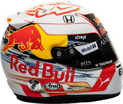 The helmet has a coloured reflective visor and four air vents. F1 Drivers Wait For 2019 Helmet Approval