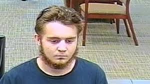 Durham, NC, police charge, seek Cary man in Suntrust bank robbery