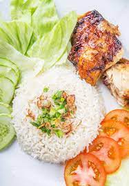 Sajikan dengan sedikit salad dan tomato. Popular Malaysian Dish Nasi Ayam Or Chicken Rice With Baked Chicken Stock Photo Picture And Royalty Free Image Image 39351086