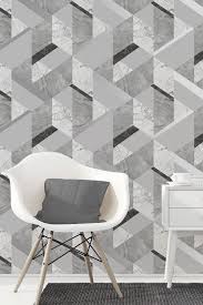 Black And Grey Wallpaper For Living Room A Beautiful Albany Wallpaper Design Featuring A Marble Effect Geometri Grey Wallpaper Accent Wall Wallpaper Living Room Accent Wall Accent Walls In Living Room