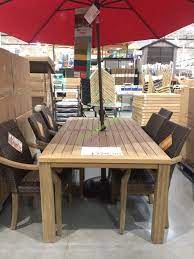 Browse through various teak dining sets and find pieces that suit your needs at a great value. 7pc Teak Dining Set With Woven Stacking Arm Chairs Costcochaser