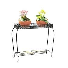 Plant Stands Planters The Home Depot A plant stand is a great way to draw attention to your plant, while also lifting it off the ground.