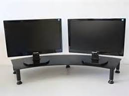The double monitor standing desk must have a surface large enough so that both monitors fit and so that there is still some more room for the accessories. Dual Monitor Stand Dual Monitor Stand Monitor Stand Dual Monitor Desk