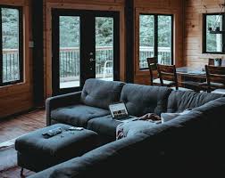 An ottoman that doubles as a coffee table can provide extra seating. Putting A Sofa In Your Kitchen Is Officially A Thing Zatot Vn