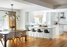 Some open kitchen designs even feature islands with sinks, to maintain the classic work triangle between the sink, refrigerator and stove. Kitchen Of The Week Clean And Contemporary With Easy Flow