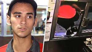 WATCH: McDonald's hero jumps through drive-thru window to help driver