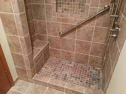 Most bathtub and shower combos come standard and are 60 inches by 30 inches by 72 inches or 60 inches by 36 inches by 72 inches. 5 Foot Tile Shower With Seat Shower Tile Walk In Shower Shower Remodel
