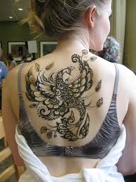 Making a tattoo is a very responsible decision in the life of those that want to have it. Fantastic Henna Style Upper Back Tattoo Of Beautiful Bird Tattooimages Biz