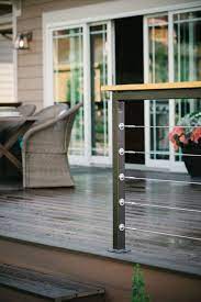 All our kits are perfect for: Modern Deck Railing And Reclaimed Wood Posts Cable Railing Deck Modern Deck Diy Deck