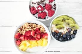 A yogurt bar is clutch for brunch or any party setting because it allows your guests to customize their parfait — and they get to keep mingling while they it's time to purchase the yogurt and a few different toppings. Yogurt Bar Yogurt Toppings Ideas Pretty Providence