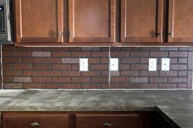 There's no distressing here so you get a white and bright, brick backsplash that. Remodelaholic Diy Whitewashed Faux Brick Backsplash