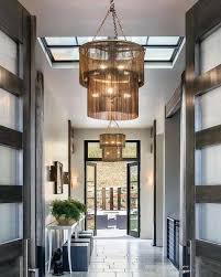 New floors, wall color, and crown molding make for a floor stain: 42 Best Foyer Lighting Ideas Designs For 2021 Entrance Lighting