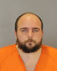 Omaha Police Department arrest 31-year-old Kevin Buczkowski in connection  with a Thursday morning disturbance over rent turned triple cutting that  left 36-year-old Adam Rodriguez, 34-year-old Patrick Buczkowski and  56-year-old Sigrid Specht with